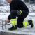 Spodnie robocze zimowe ocieplane Comfort Neo Winter — czarno-żółte, softshell 3-warstwowy 8000 mm