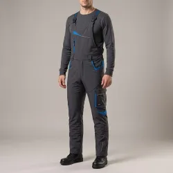 Ogrodniczki robocze zimowe ocieplane Comfort Winter grafitowo-niebieskie — softshell, elastyczne szelki, kieszeń na piersi