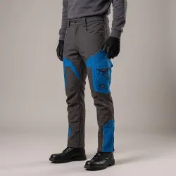 Spodnie robocze softshell Comfort Winter — grafitowo-niebieskie, wiatroszczelne, wodoodporne 350 g/m², zamki