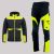 Zestaw roboczy na chłodne dni czarno-żółty — kurtka hybrydowa i spodnie softshell Comfort Winter